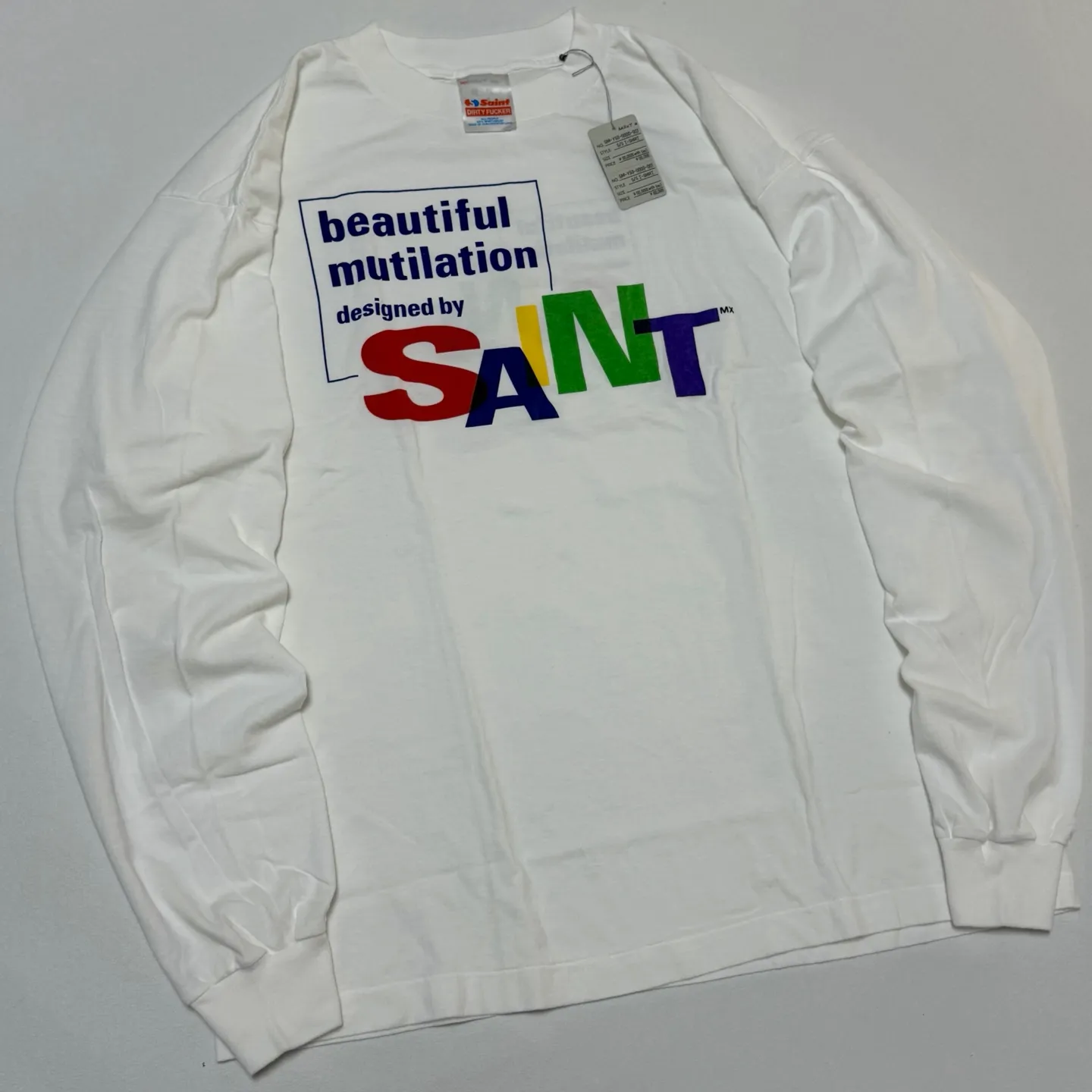 SAINT Mxxxxxx LS TEE/BEAUTIFUL SAINT/WHT Colorful SAINT slogan long-sleeved TEE White S-XL Cylindrical side seamless fabric Really made with care! Domestic printing factory OEM, original water slurry non-touch printing process, correct version, correct main mark/wash mark/little angel anti-counterfeiting mark